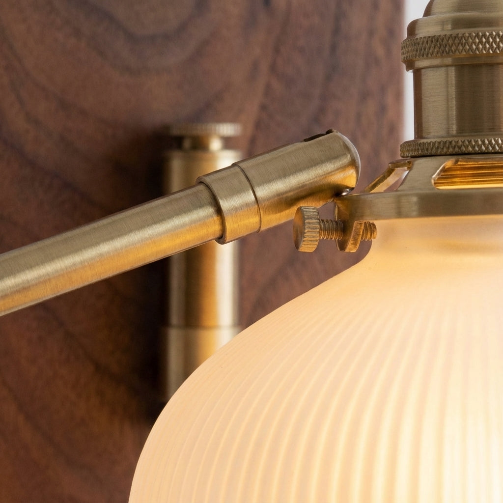 Adjustable wall lamp with swivel arm – Brillora
