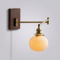 Adjustable wall lamp with swivel arm – Brillora