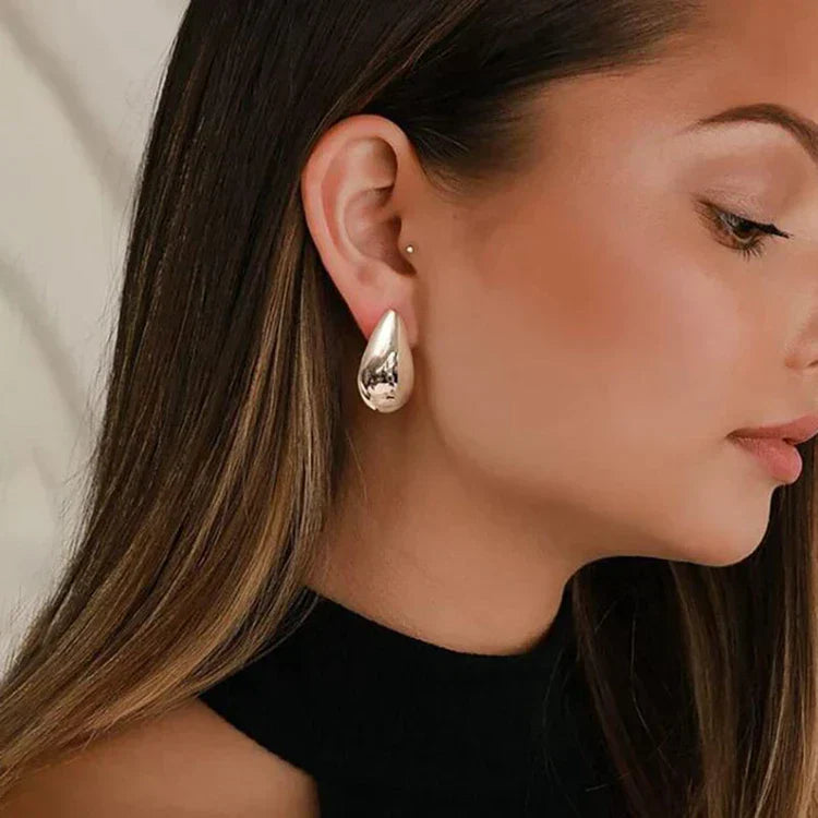 ShineDrop™ Feminine Statement Glow