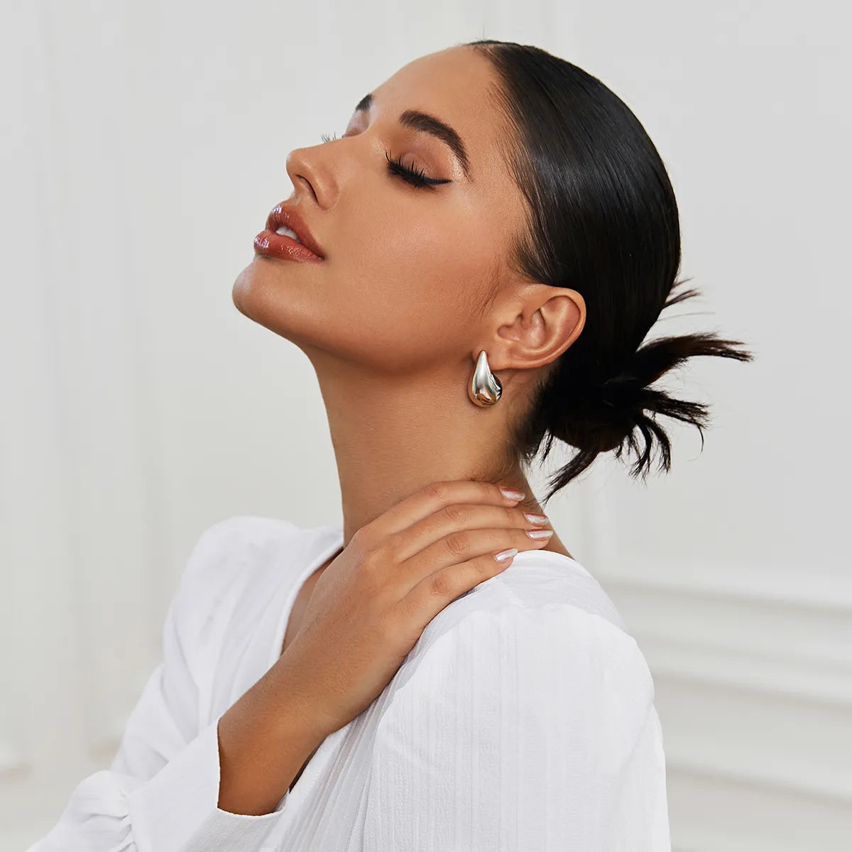 ShineDrop™ Feminine Statement Glow